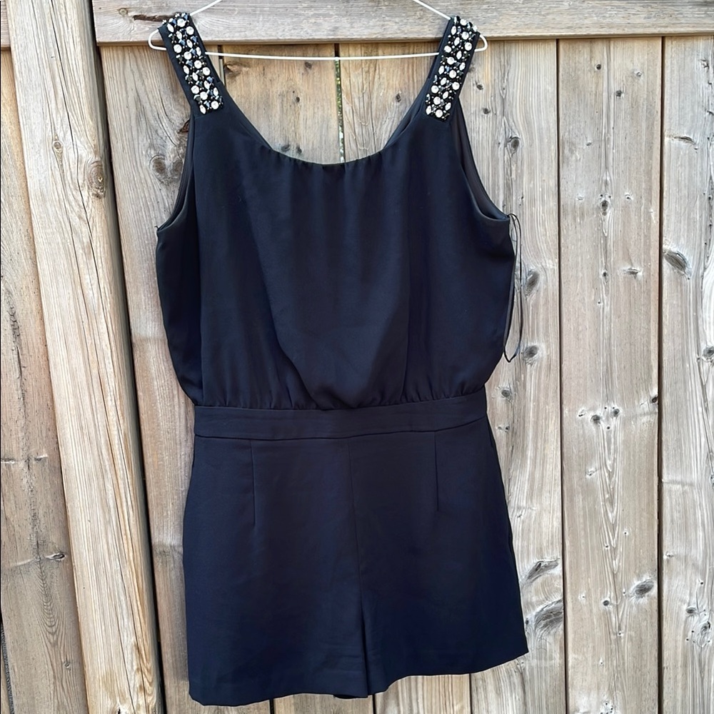 Bejeweled black jumpsuit with pockets!  Great alternative to the LBD!